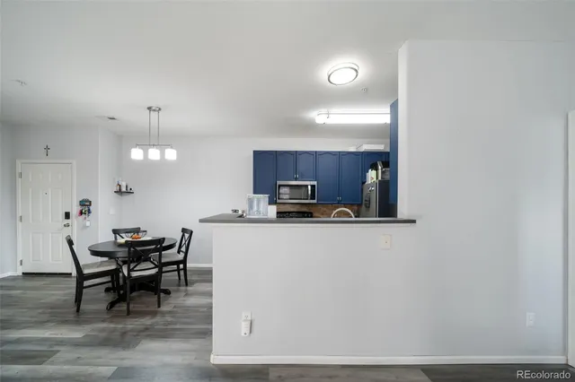 a view of a dining room with furniture