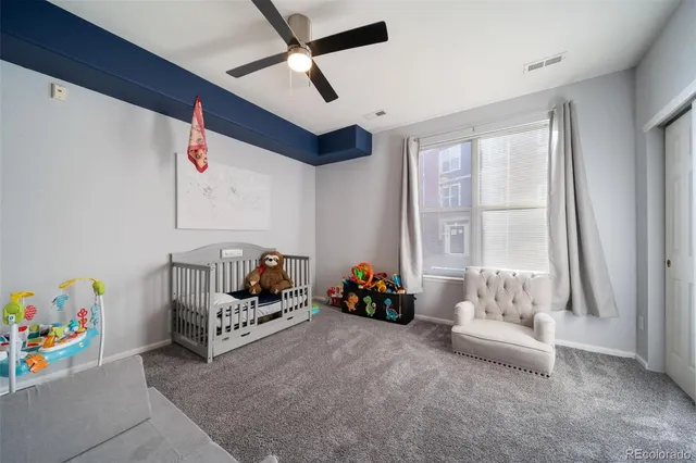 a bedroom with furniture and a couch