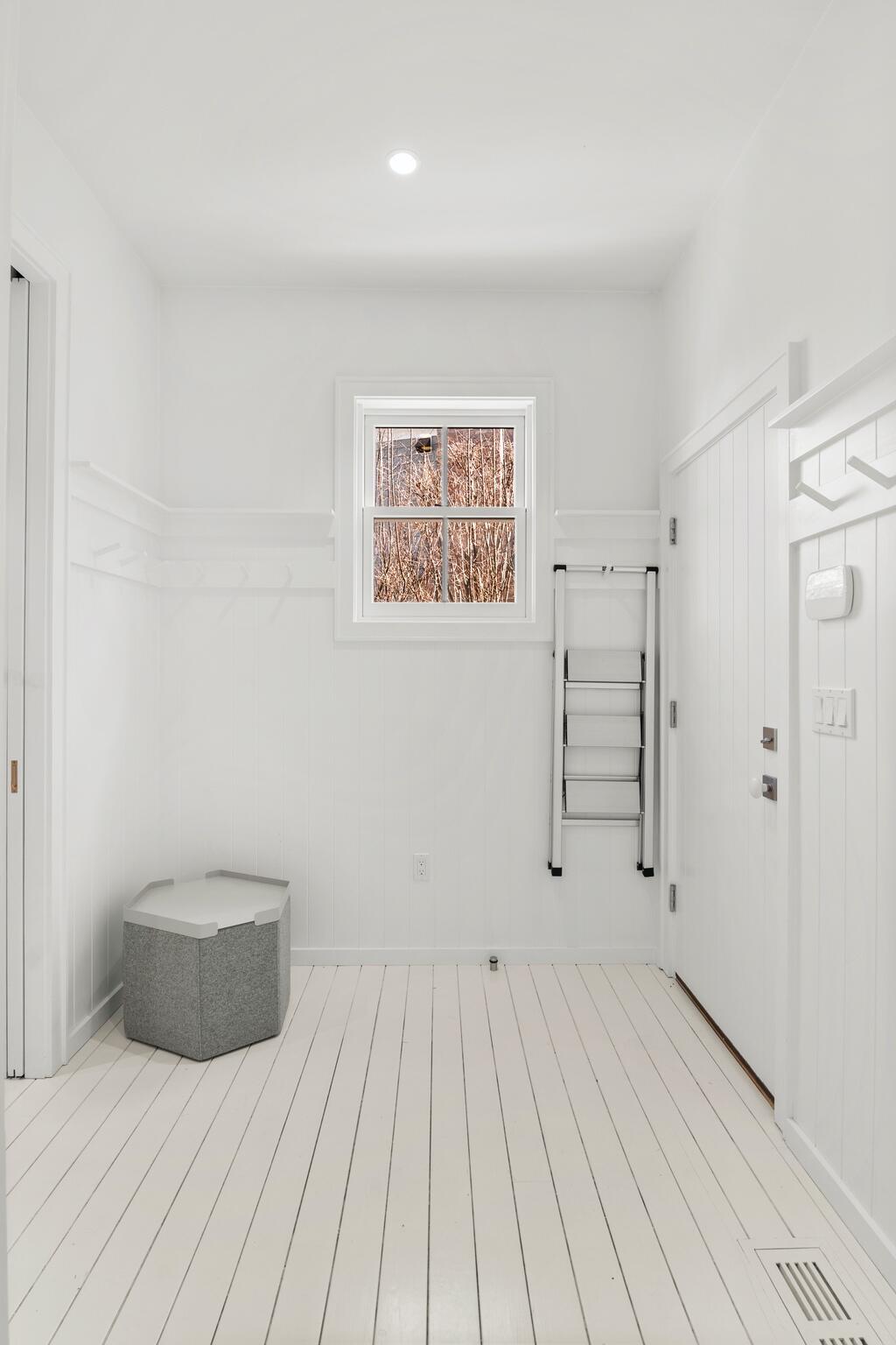 17 Meridian Road Rowayton, CT 06853 - Photo 17 of 40 a view of a room with wooden floor and white walls