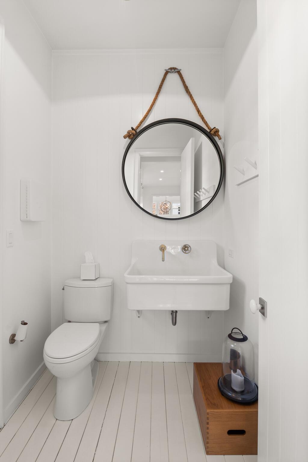 17 Meridian Road Rowayton, CT 06853 - Photo 18 of 40 a bathroom with a sink toilet and a mirror