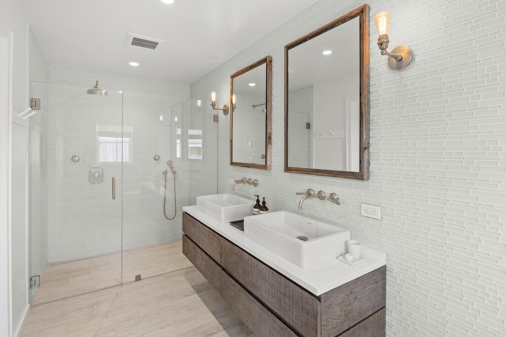 17 Meridian Road Rowayton, CT 06853 - Photo 19 of 40 a bathroom with a sink a toilet and shower