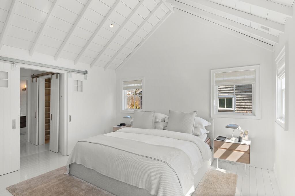 17 Meridian Road Rowayton, CT 06853 - Photo 3 of 40 a bedroom with a bed and a window