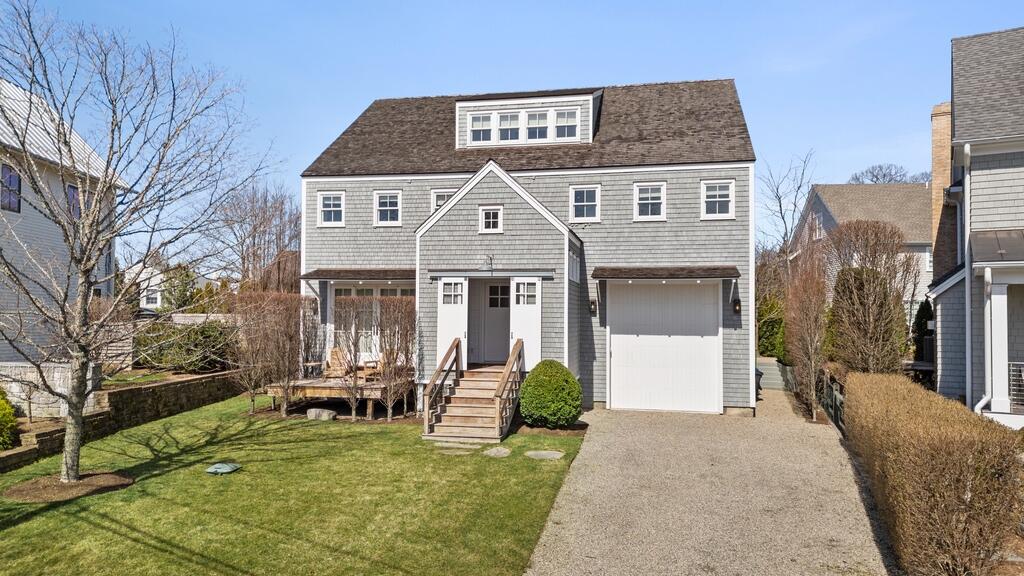 17 Meridian Road Rowayton, CT 06853 - Photo 31 of 40 a front view of a house with a yard