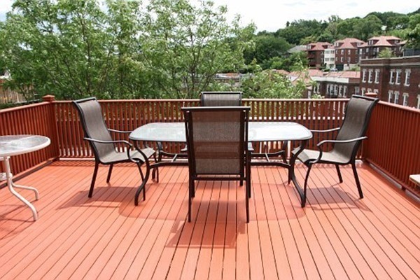 85 Brainerd Road, Unit 510 Boston, MA 02134 - Photo 2 of 25 a view of a chairs on the roof deck