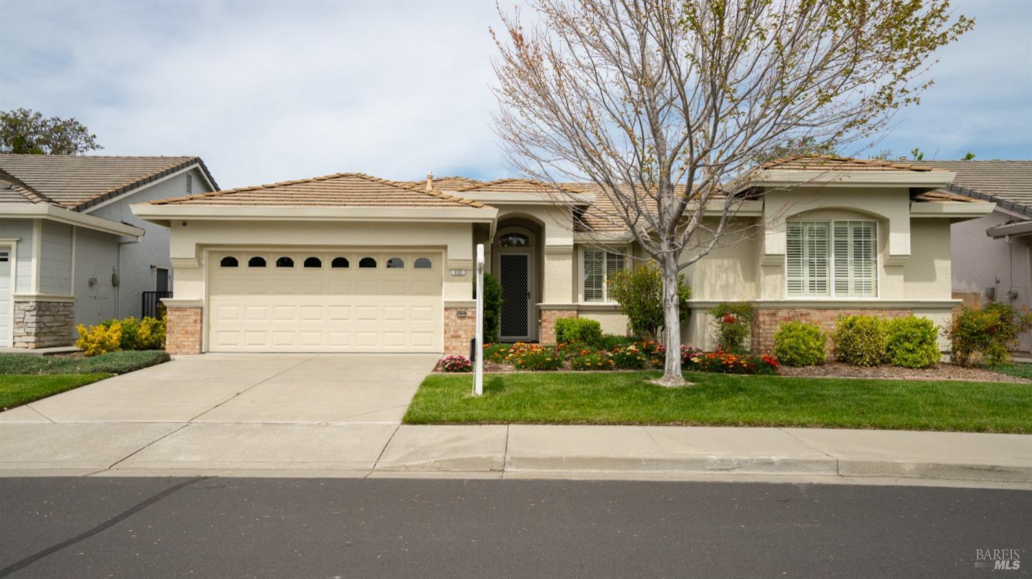 112 Mandarin Circle Vacaville, CA 95687 - Photo 1 of 1 a front view of a house with a yard and garage