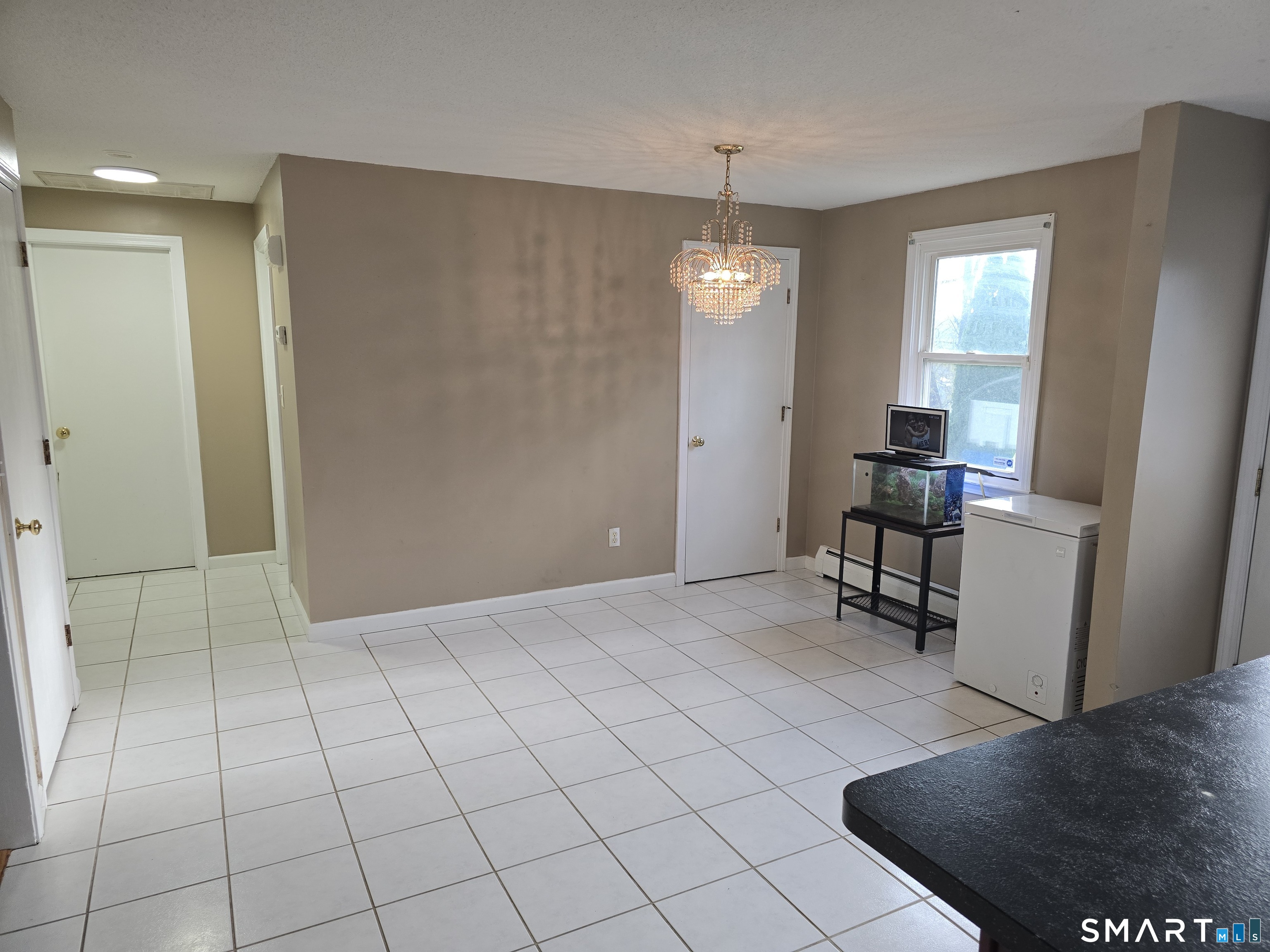 118 Norton Street Waterbury, CT 06708 - Photo 7 of 12 a view of a livingroom with a furniture