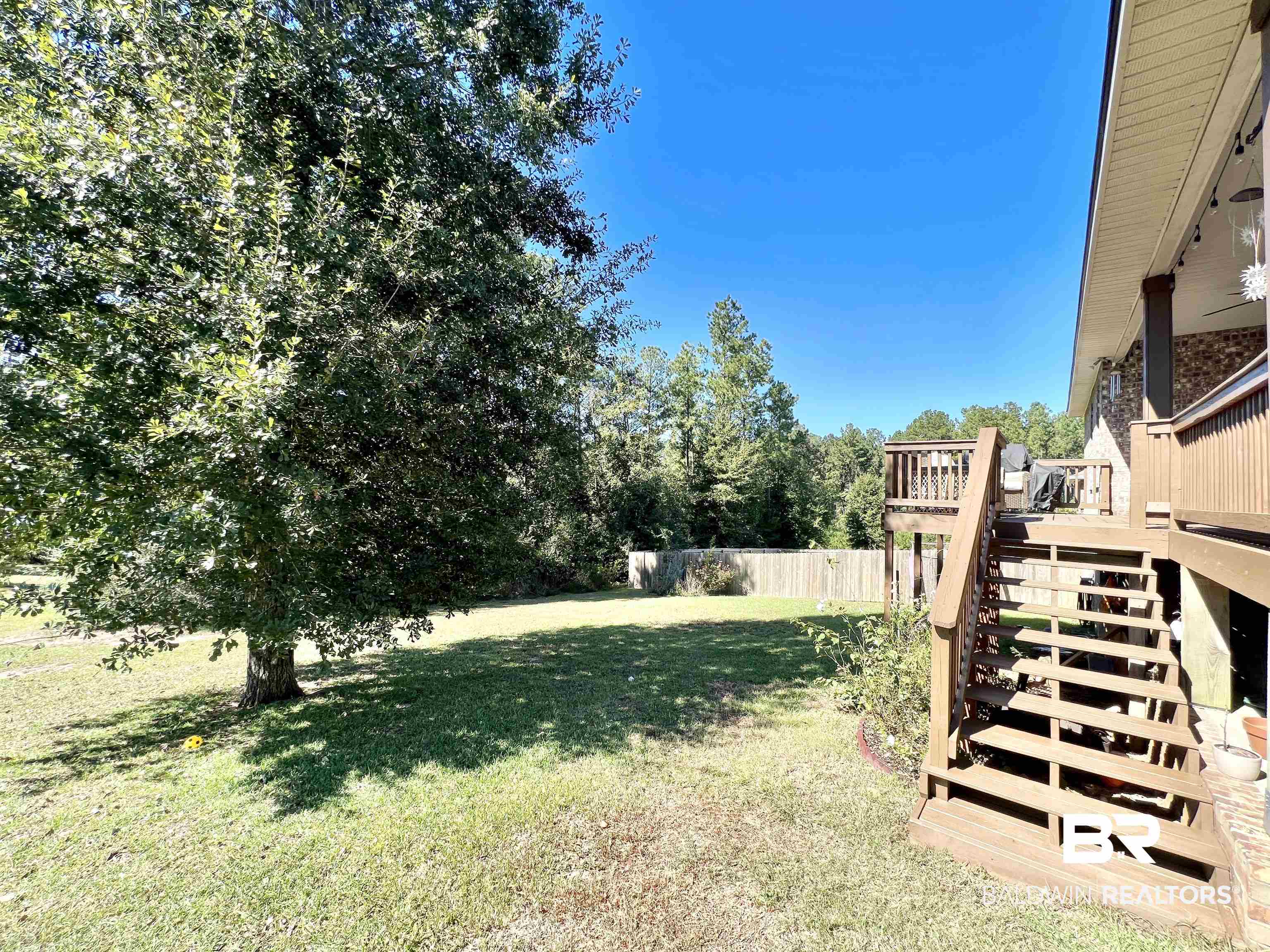 32290 Calder Court Daphne, AL 36527 - Photo 54 of 59 View of yard with a wooden deck