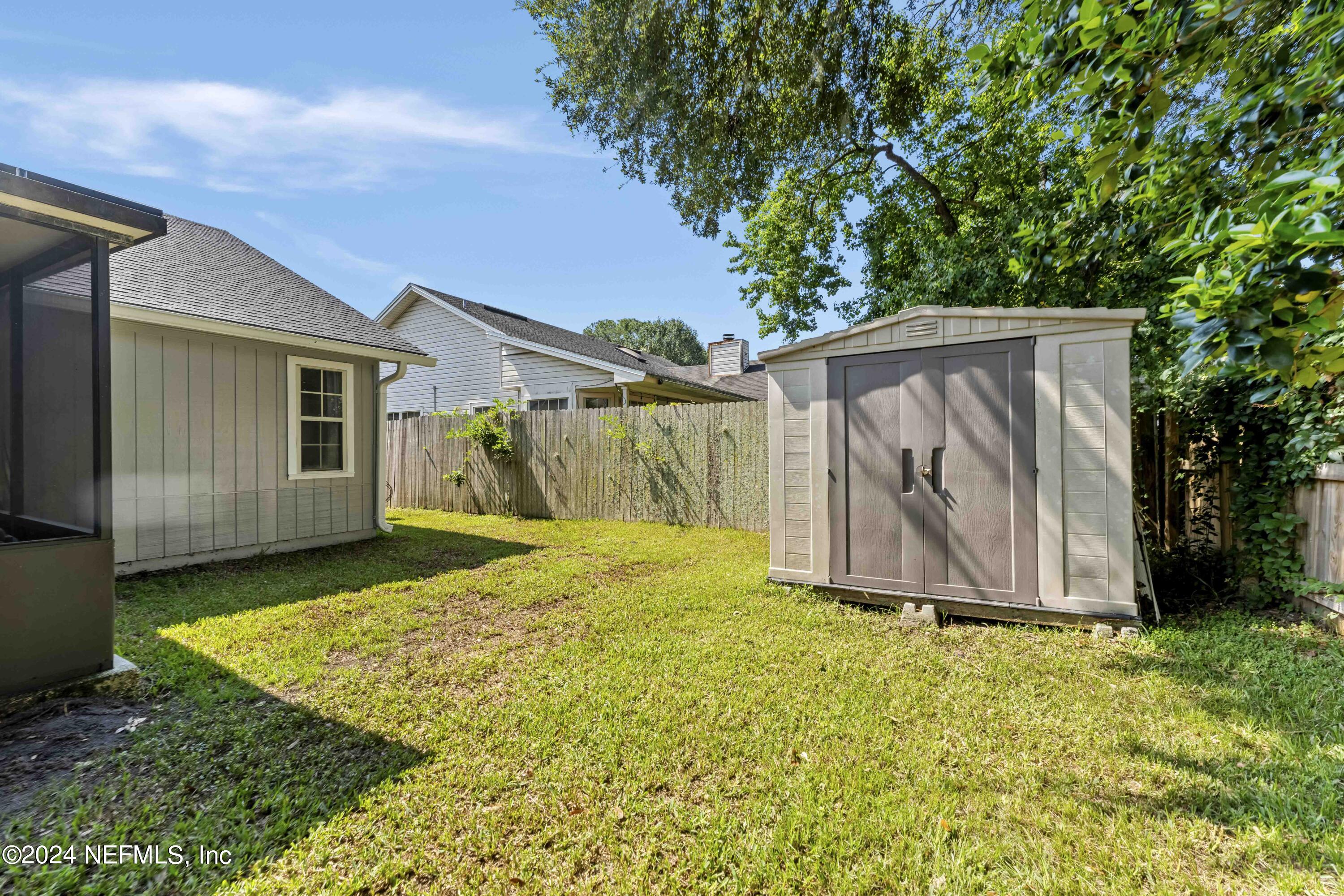 8808 Goodbys Trace Drive Jacksonville, FL 32217 - Photo 22 of 25 a view of a backyard