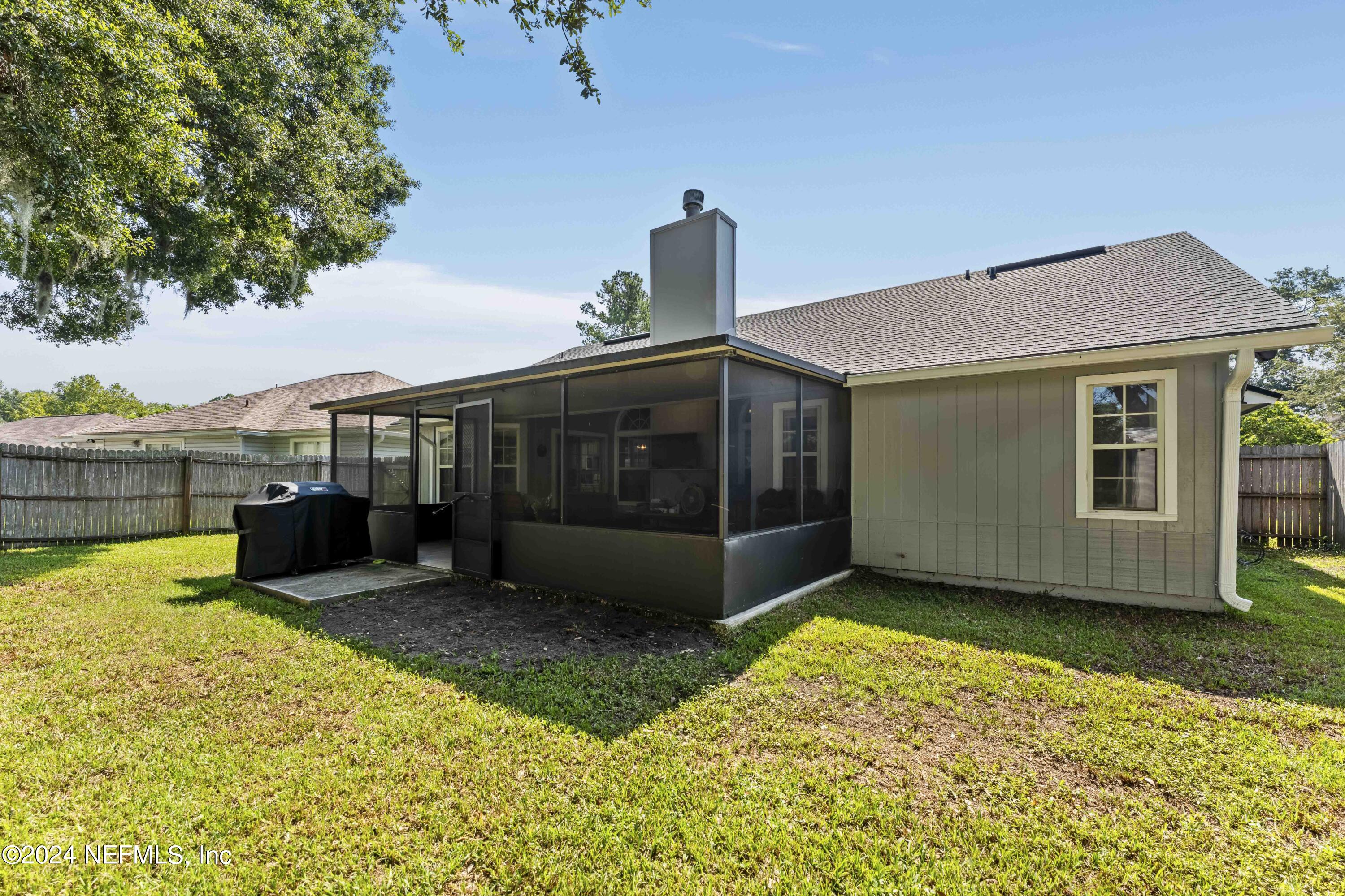 8808 Goodbys Trace Drive Jacksonville, FL 32217 - Photo 23 of 25 a view of a house with a yard