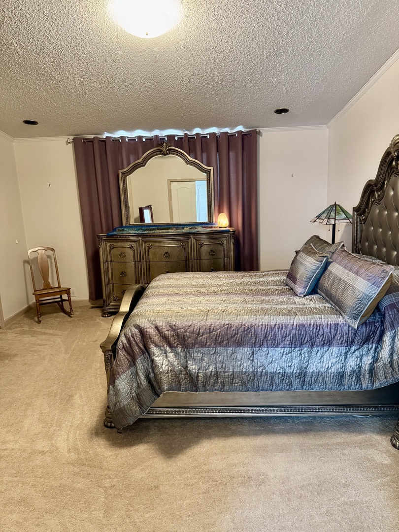 265 Tulip Circle Matteson, IL 60443 - Photo 16 of 25 a bedroom with a bed and a couch