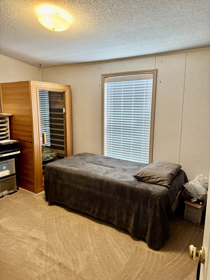 265 Tulip Circle Matteson, IL 60443 - Photo 24 of 25 a bedroom with a bed and dresser