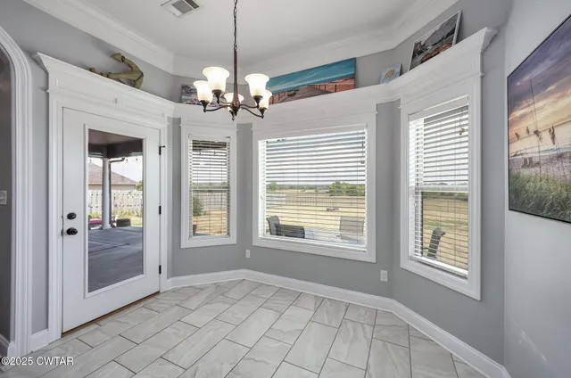 a kitchen with stainless steel appliances granite countertop a stove and a sink