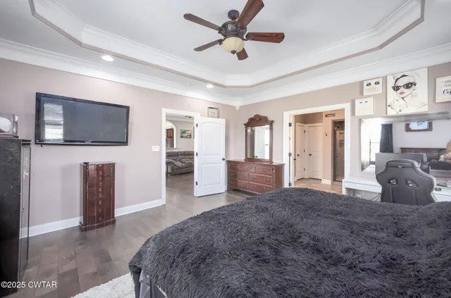 a living room with furniture and windows