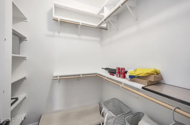 a view of a livingroom with furniture swimming pool and outdoor space