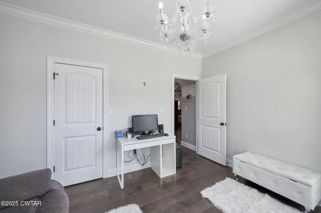 a view of a lake with couches and wooden floor