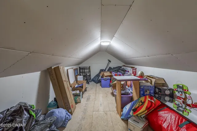 a front view of house with yard outdoor seating and barbeque oven