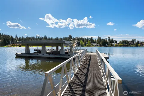 a view of a lake in middle of the house