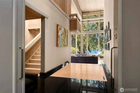 a view of balcony with furniture