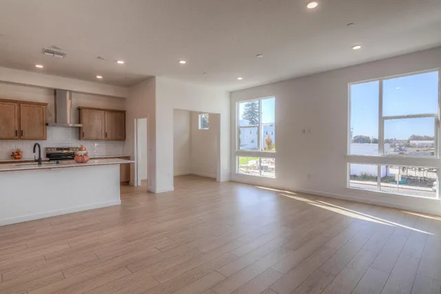 a bathroom with a toilet a sink and bathtub