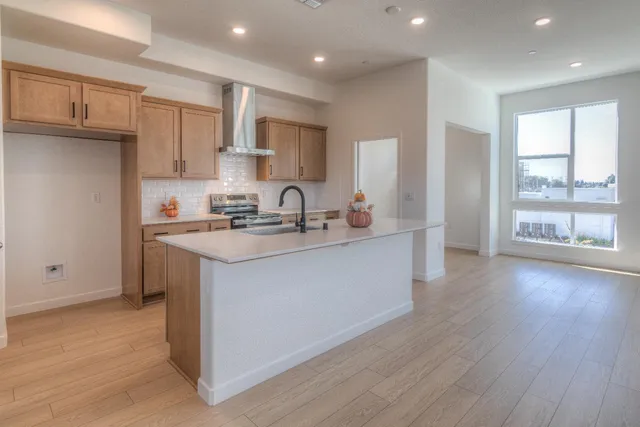 a bathroom with a sink vanity and mirror