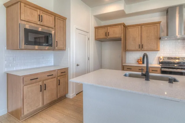 a bathroom with a shower and a glass door