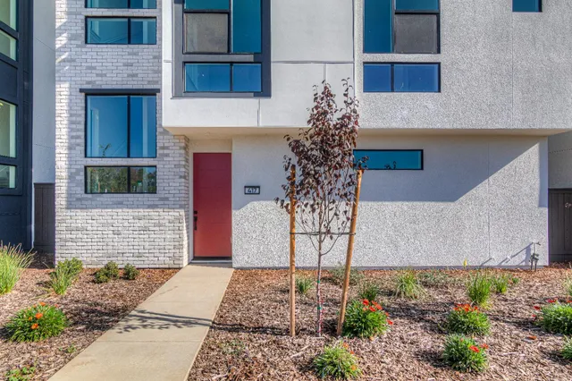 a view of a hallway with staircase