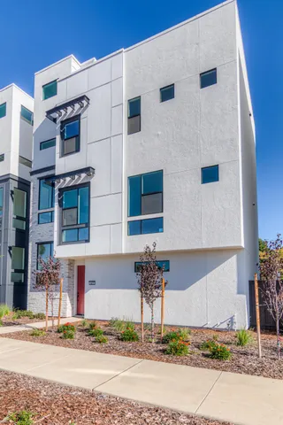 a view of a kitchen with a sink cabinets and a dishwasher
