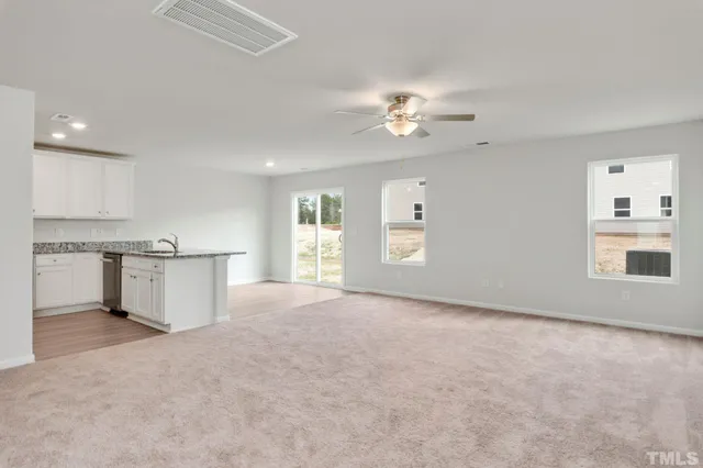 a view of a kitchen with marble kitchen and a fireplace