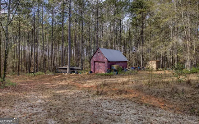 a bedroom with furniture and a closet
