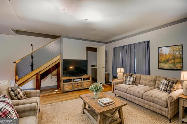 a living room with furniture and a couch