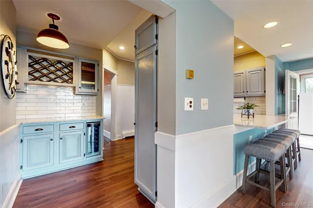 a view of a kitchen cabinets and wooden floor