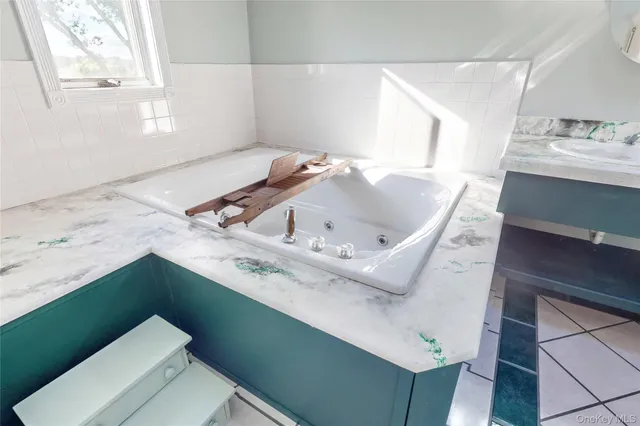 a view of an empty room with stairs