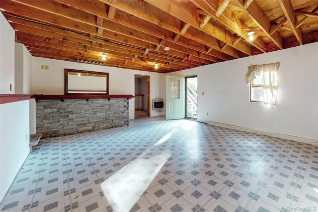 an aerial view of residential house with outdoor space and swimming pool