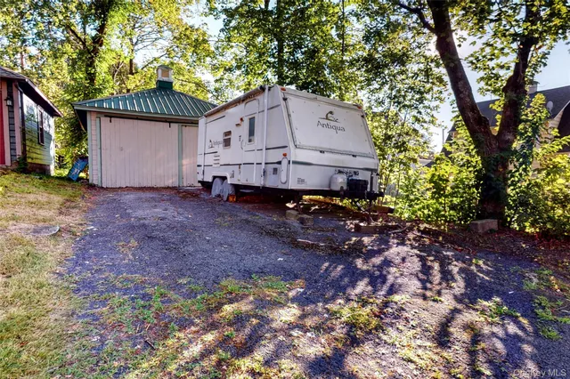 a house with trees in the background