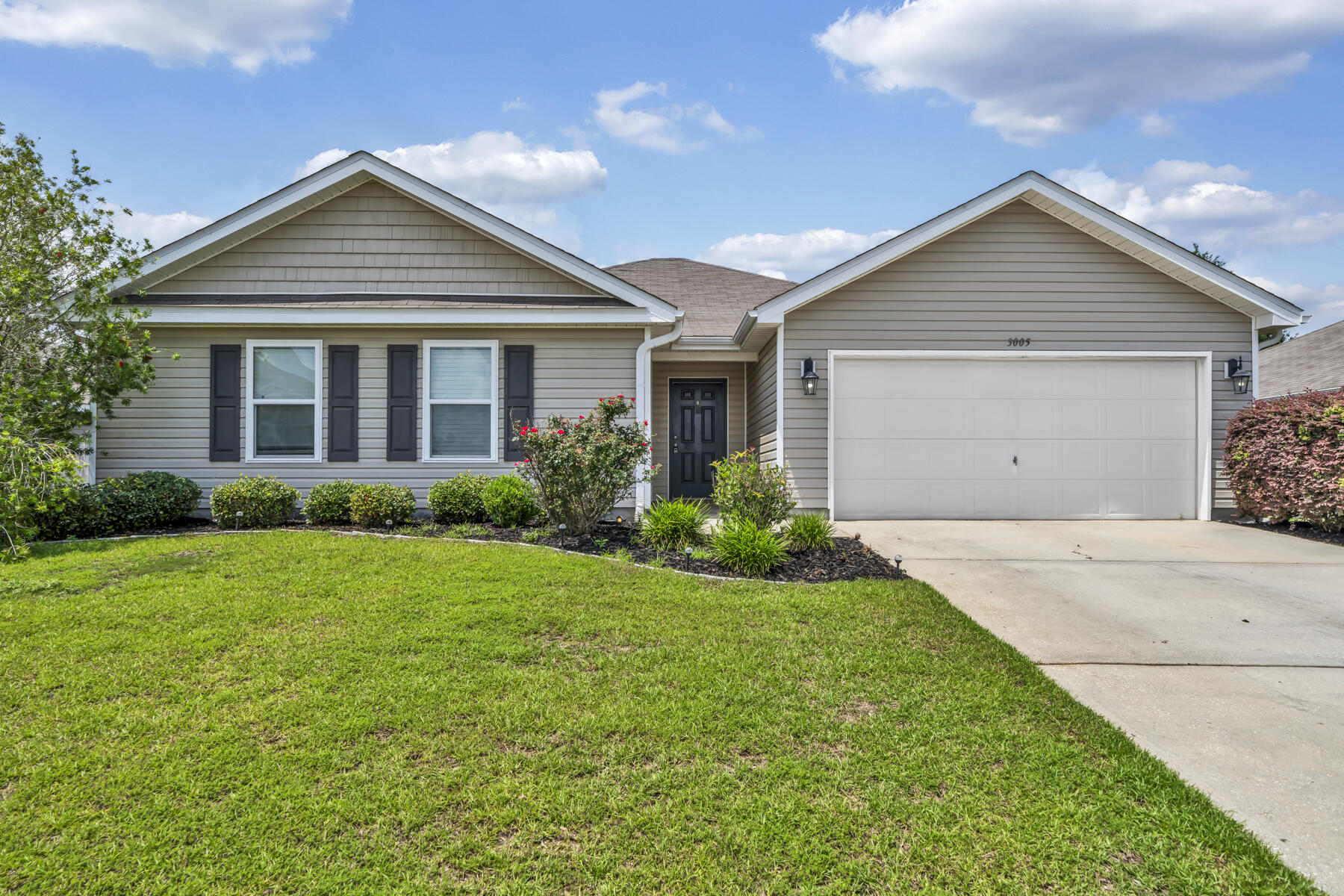 a view of a house with garden