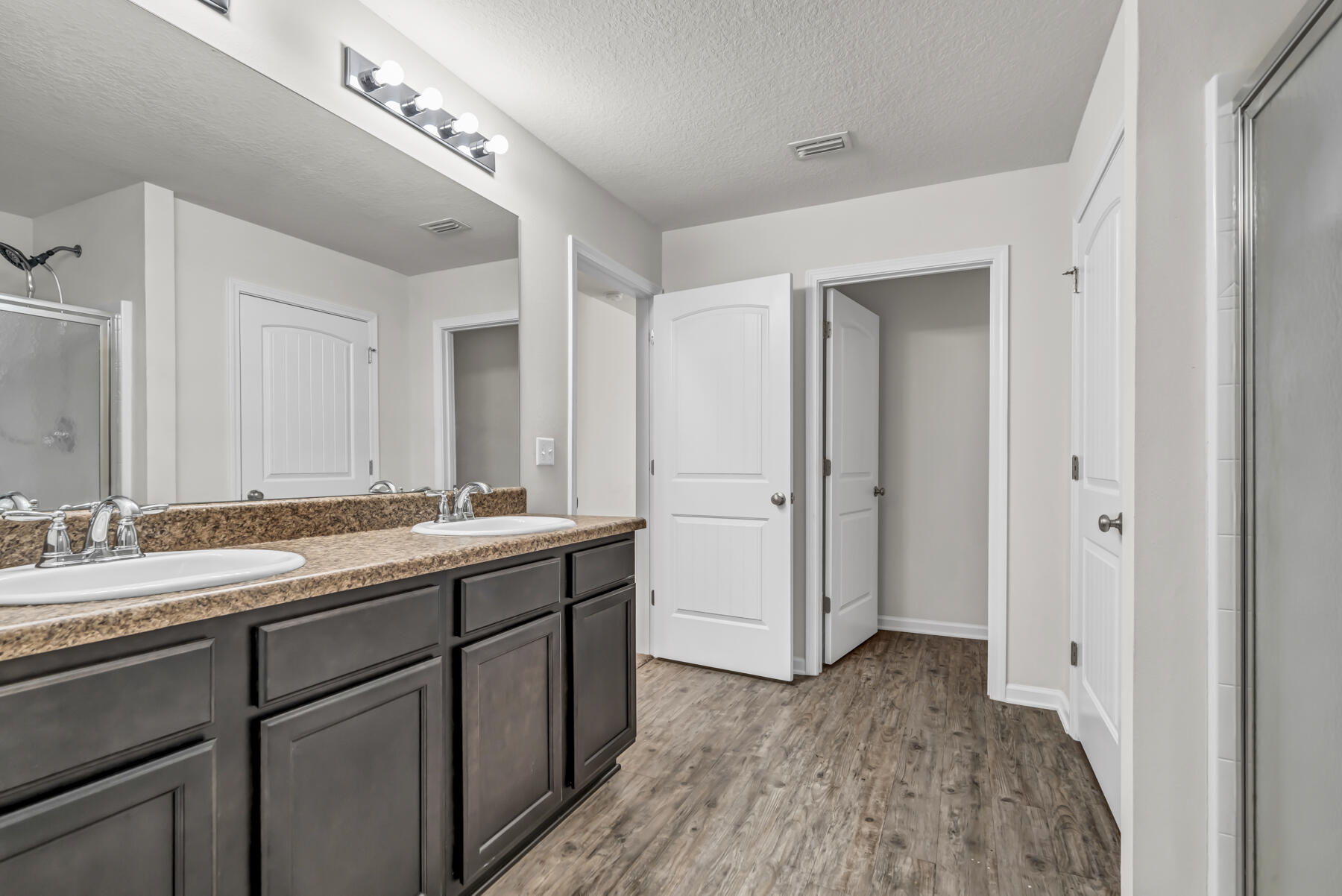 3005 Raven Lane Crestview, FL 32539 - Photo 15 of 24 a bathroom with a sink and a mirror