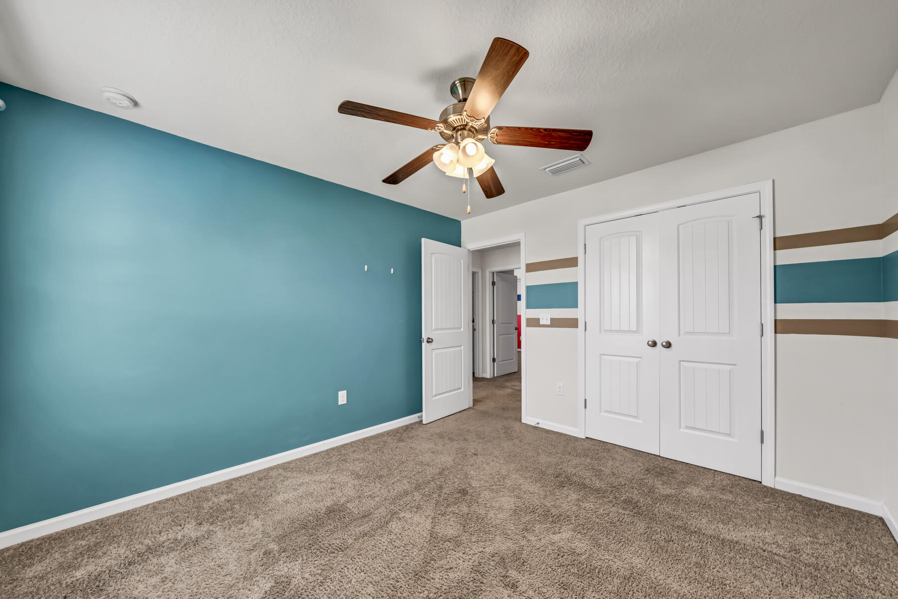 3005 Raven Lane Crestview, FL 32539 - Photo 18 of 24 a view of a room with a ceiling fan