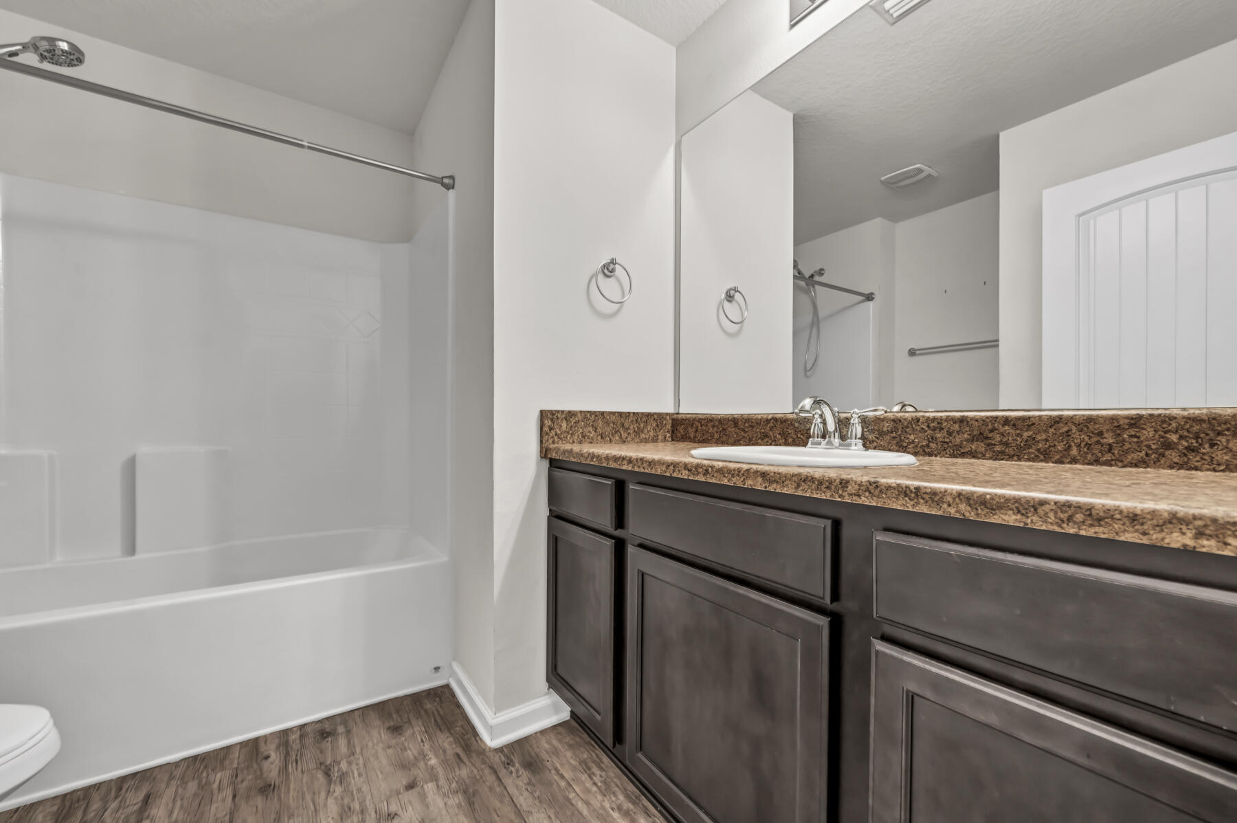 3005 Raven Lane Crestview, FL 32539 - Photo 19 of 24 a bathroom with a sink and a mirror