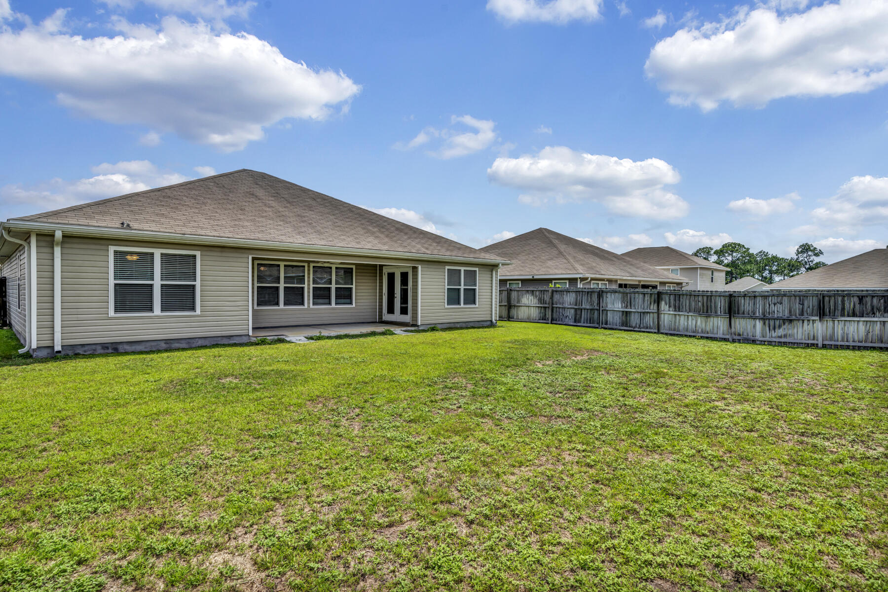 3005 Raven Lane Crestview, FL 32539 - Photo 23 of 24 a front view of a house with a garden