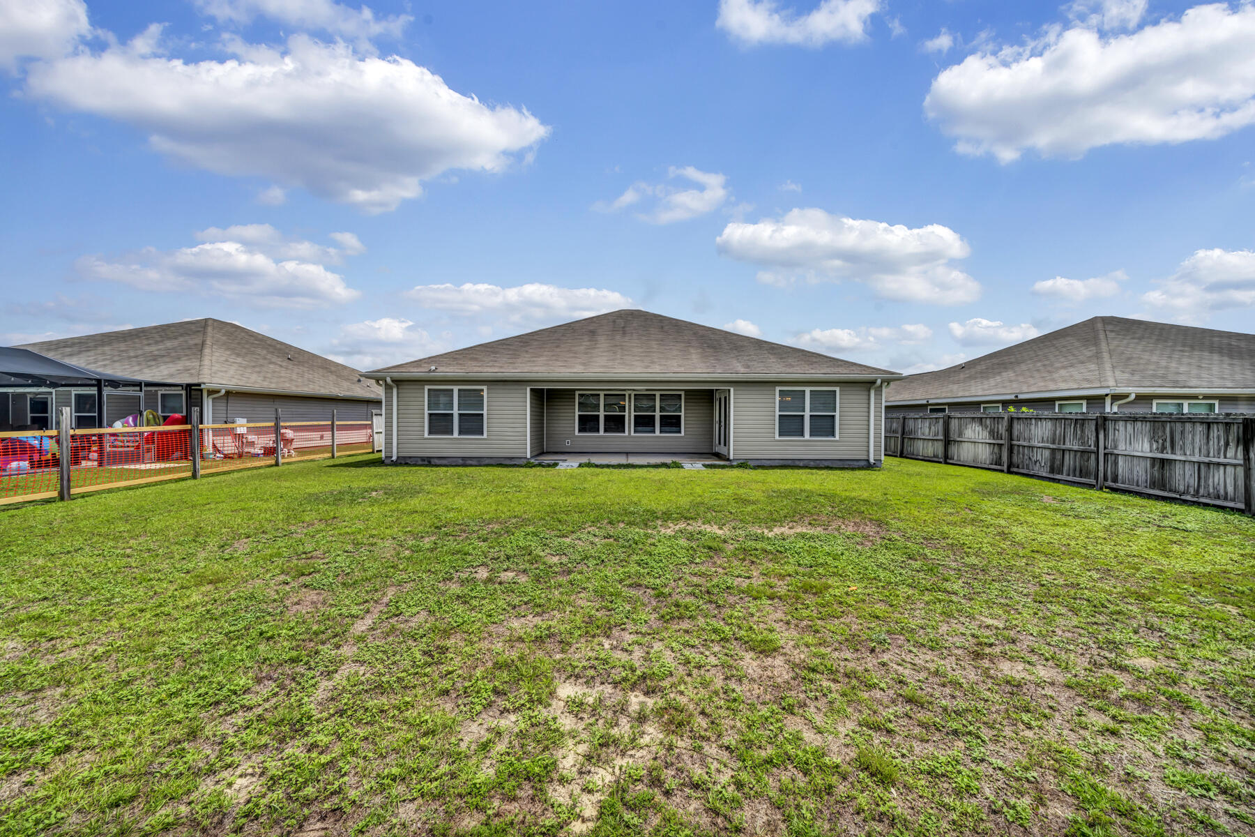 3005 Raven Lane Crestview, FL 32539 - Photo 24 of 24 a front view of house with yard and green space