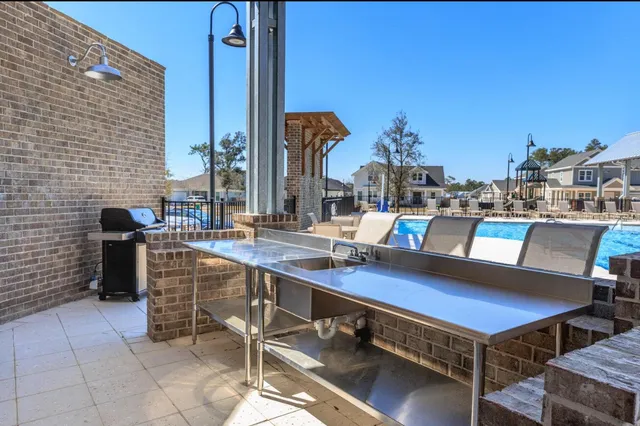 a view of a chairs and table in the terrace
