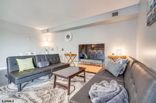 a living room with furniture and a couch