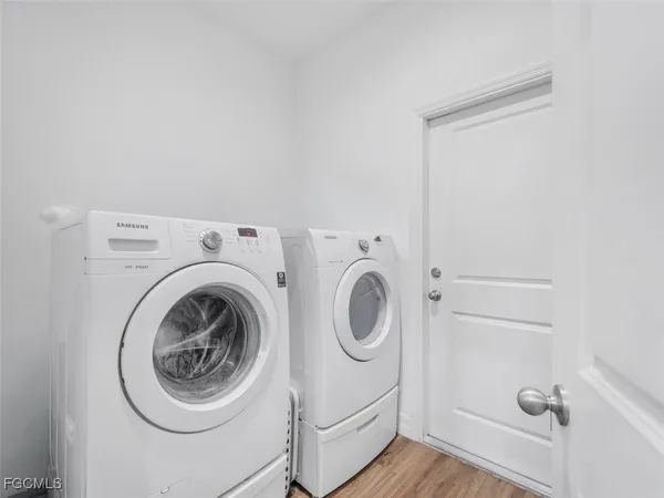 a utility room with dryer and washer