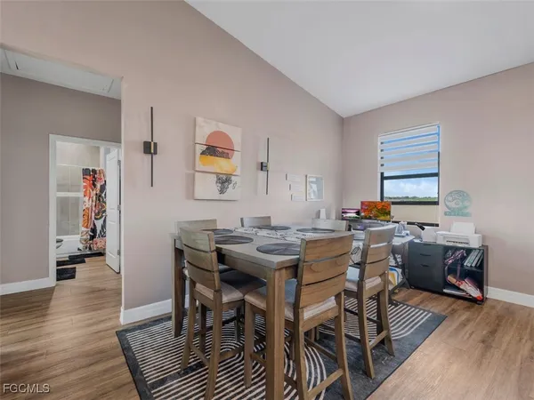 a view of a dining room with furniture