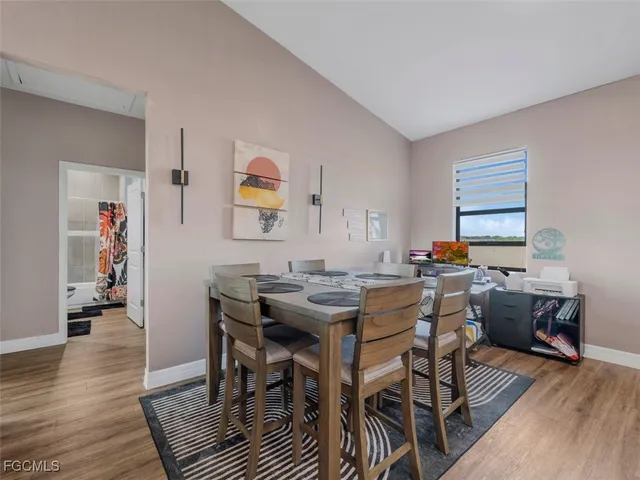 a view of a dining room with furniture