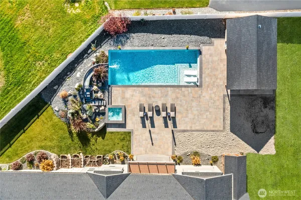 a view of swimming pool with a yard