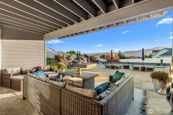a outdoor space with patio lots of furniture and mountain view