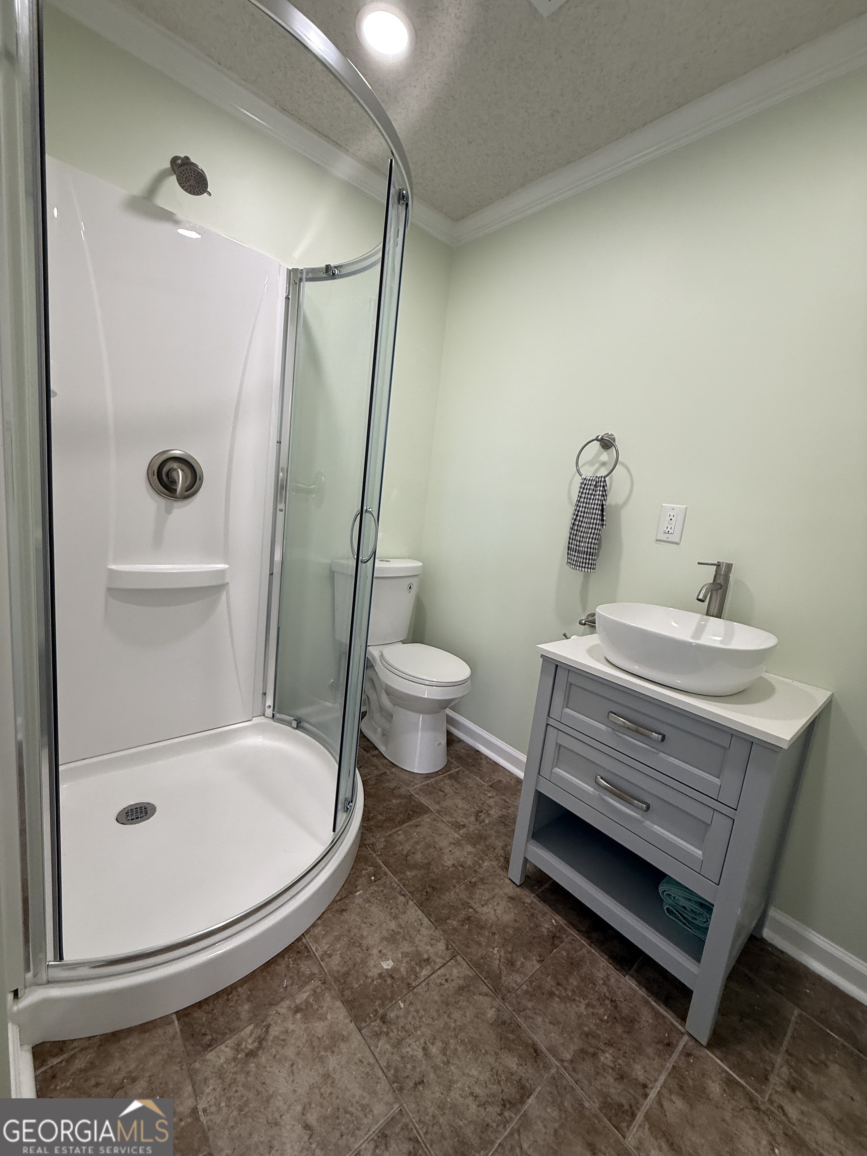 646 McLendon Street Ashburn, GA 31714 - Photo 29 of 63 a bathroom with a sink toilet and shower