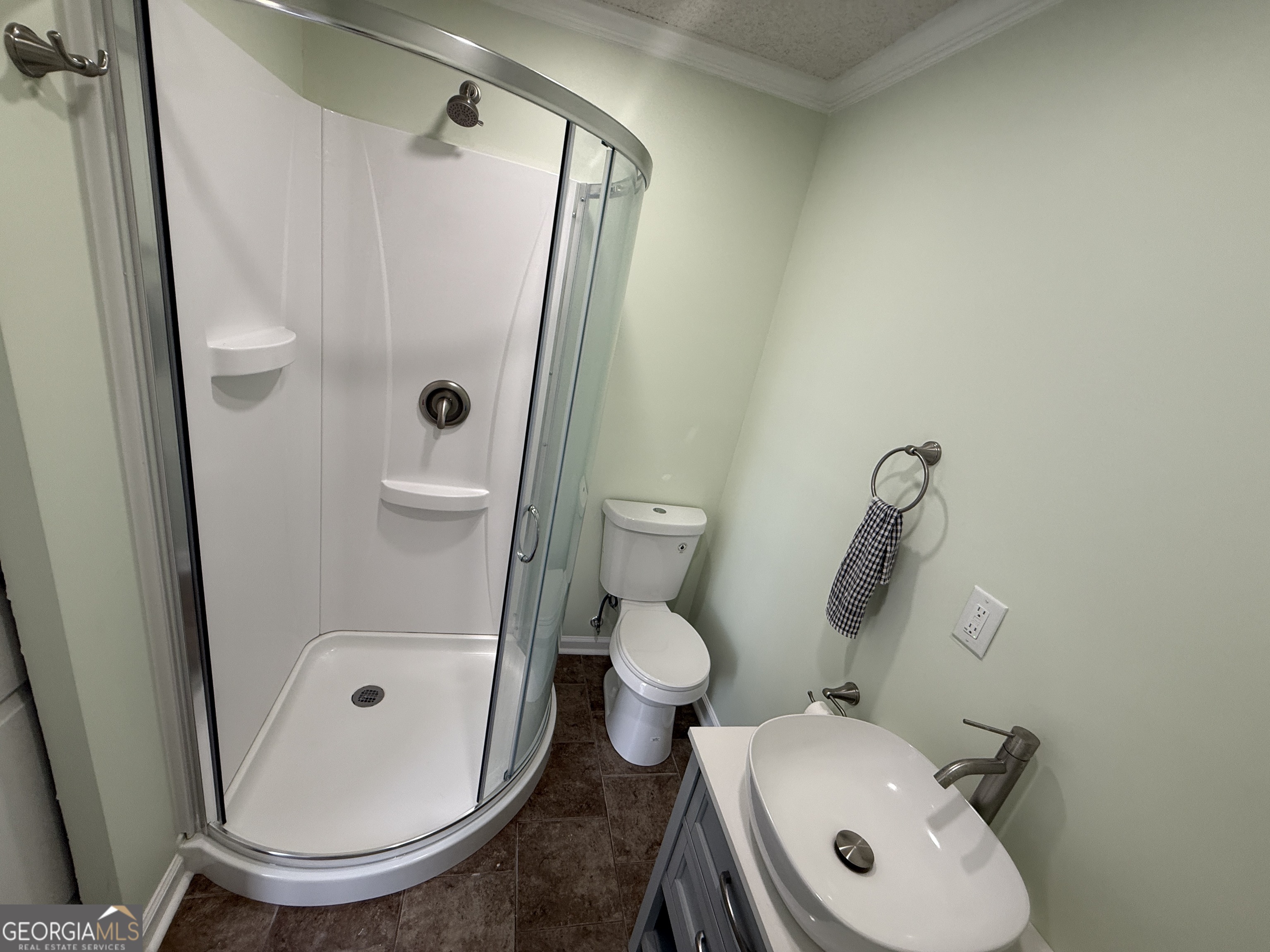 646 McLendon Street Ashburn, GA 31714 - Photo 30 of 63 a bathroom with a toilet and a sink