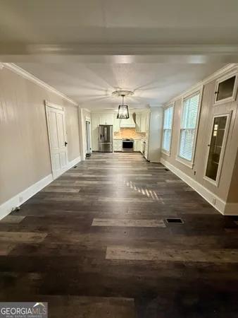 a bathroom with a sink vanity and a mirror